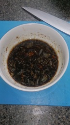 a mixture of soy sauce, oil, lemon juice and pepper